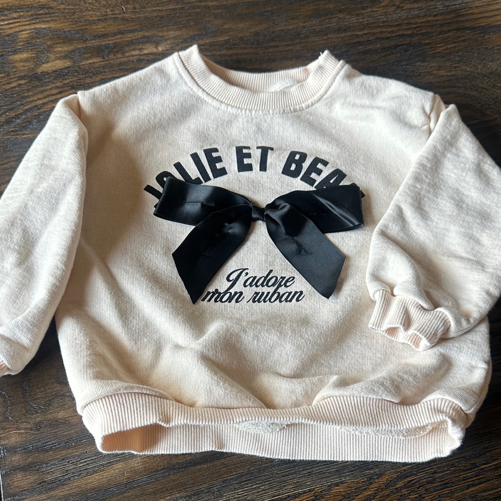 Zara Cream Sweatshirt with Black Satin Bow and Graphic